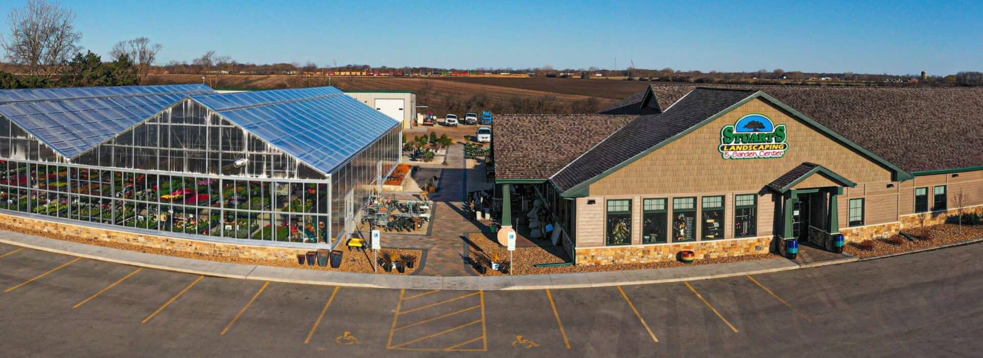 aerial shot of blue sky over Stuart's location with greenhouse