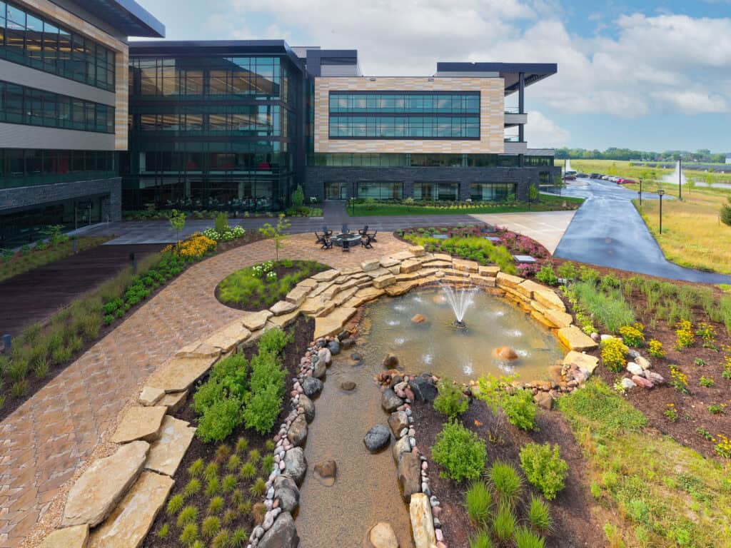 commercial landscaping crews planting median islands near the Fox River in Winnebago County, WI
