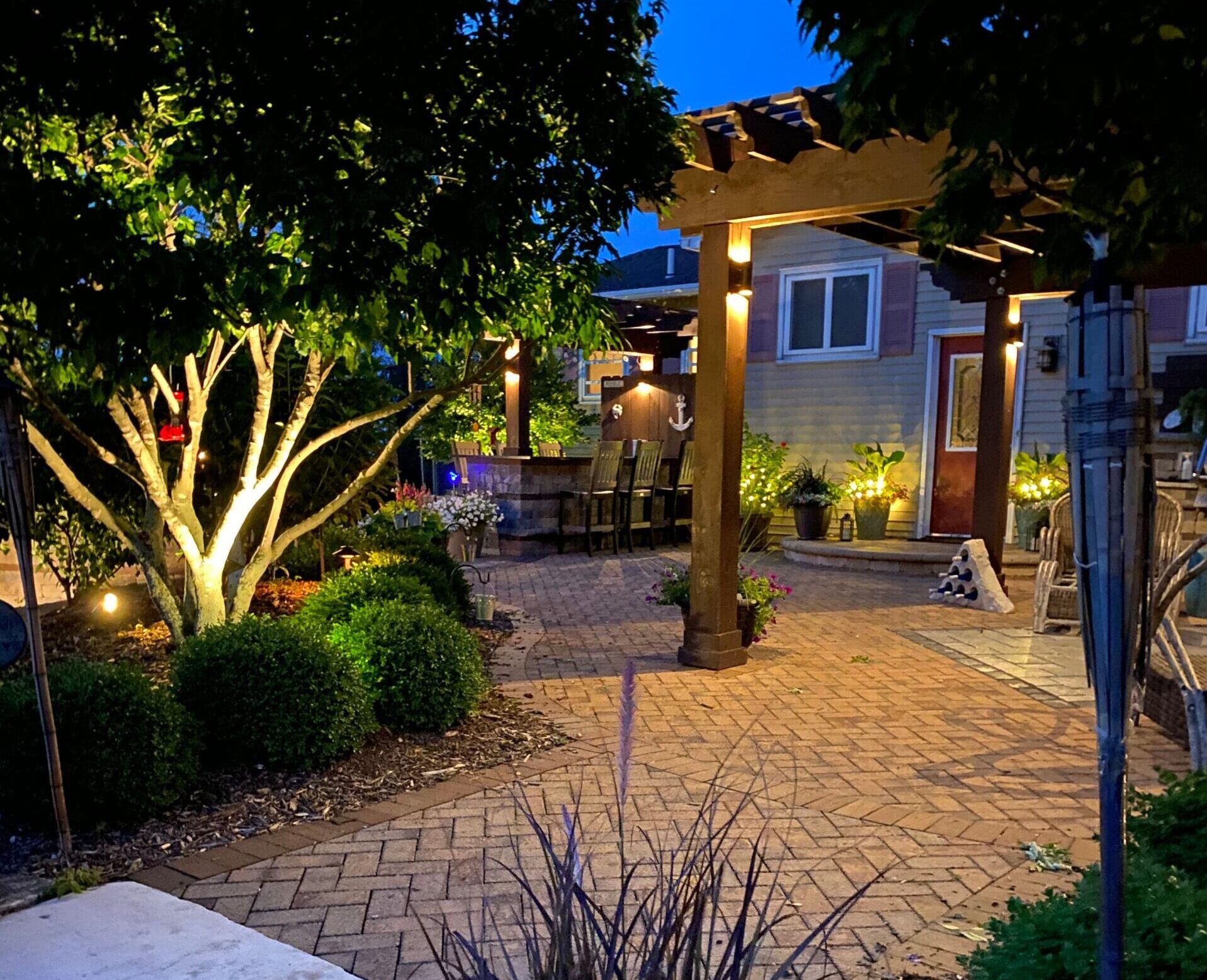Evenings That Glow: Outdoor Lighting & Planting Ideas for Oshkosh, WI, Homes