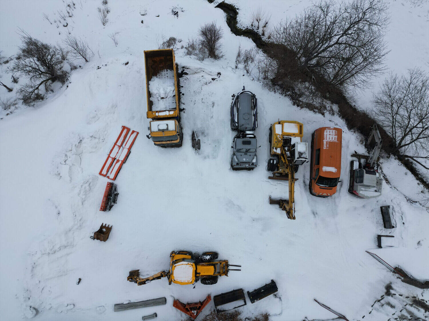Fleet of snow plows ready for commercial snow removal operations in Winnebago County, WI
