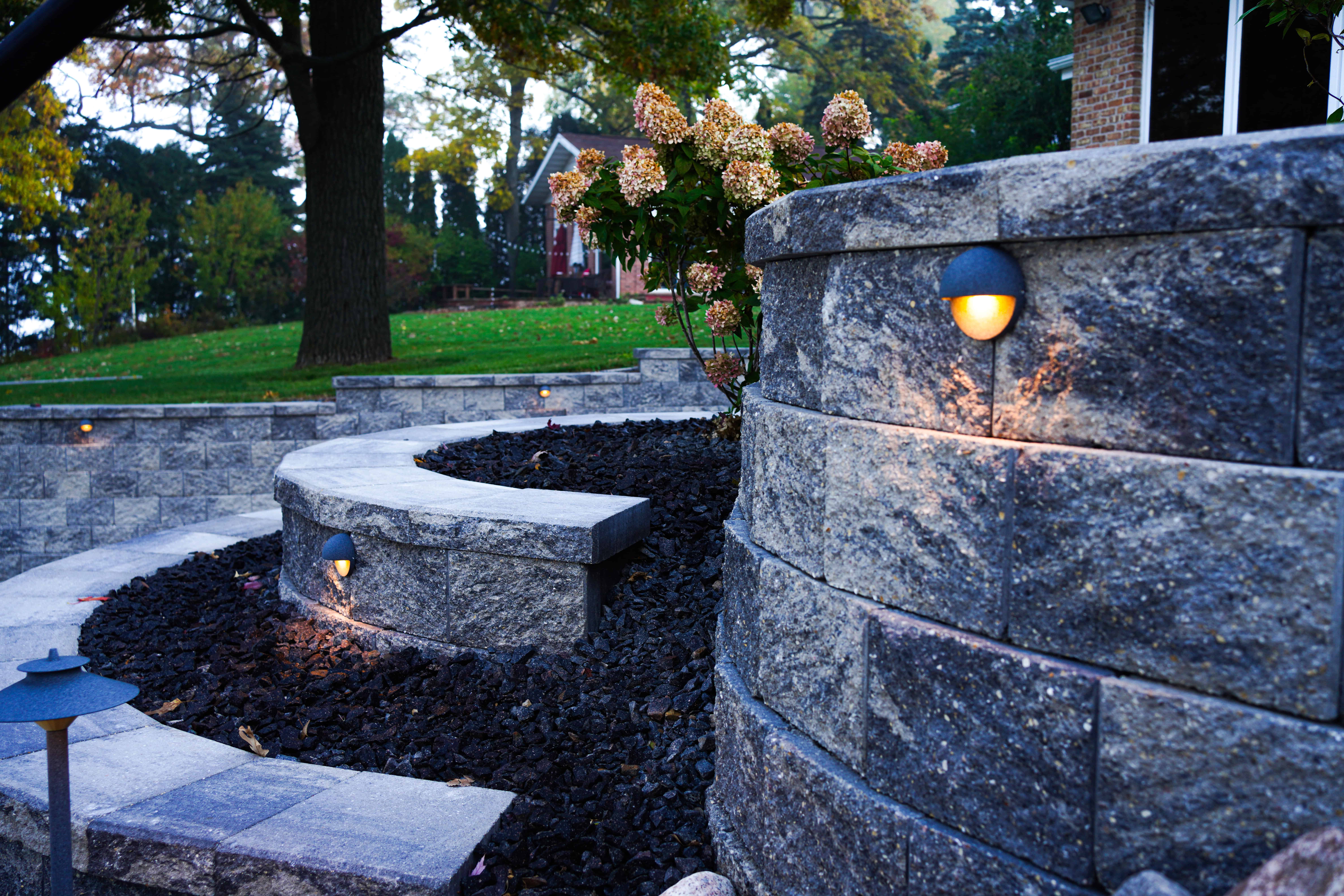5 Backyard Upgrades That Pair Perfectly With Outdoor Lighting and a Retaining Wall in Ripon, WI